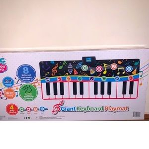 Happy Hero Giant keyboard. 8 instruments, records sounds, adjustable volume